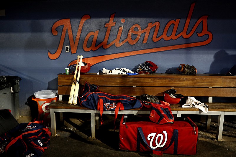 AP photo by Julio Cortez / Equipment is seen in the Washington Nationals' dugout during a spring training game against the St. Louis Cardinals on March 5 in West Palm Beach, Fla.