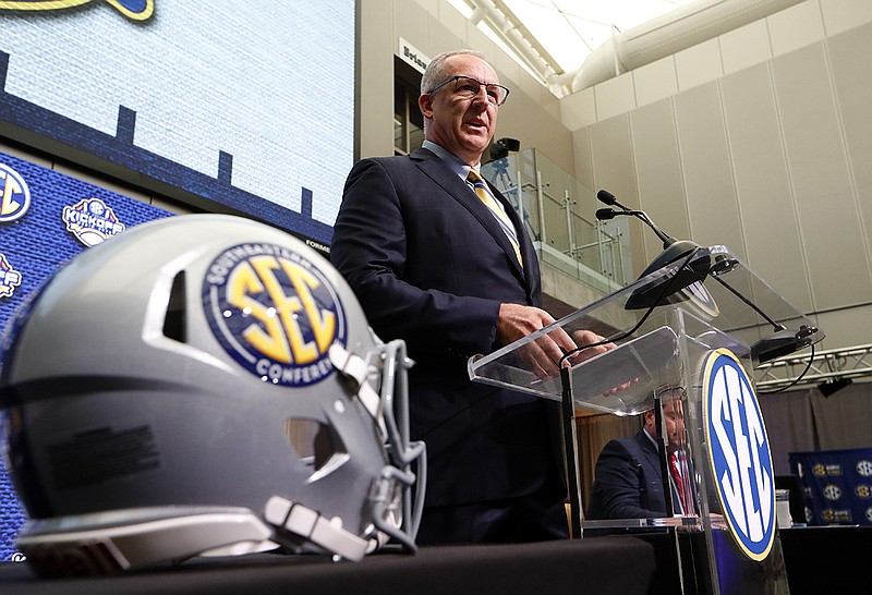 AP photo by John Bazemore / SEC commissioner Greg Sankey speaks during the league's media days event for football on July 16, 2018, in Atlanta.