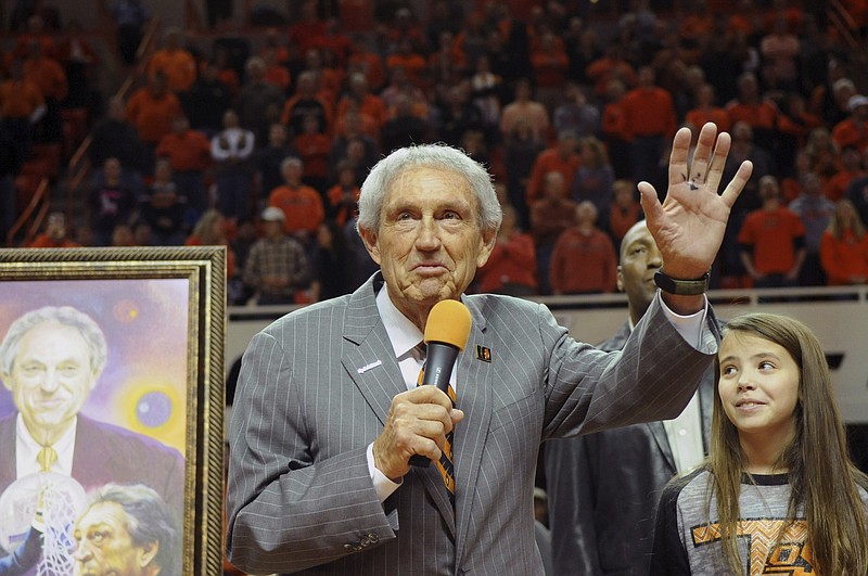 AP photo by Brody Schmidt / Former Oklahoma State men's basketball coach Eddie Sutton speaks while being honored at halftime of the Cowboys' game against Iowa State on Feb. 3, 2014, in Stillwater, Okla. Sutton directed the program to a pair of Final Four appearances after previously taking Arkansas to that round of the NCAA tournament, and he also led Creighton and Kentucky to the Big Dance.