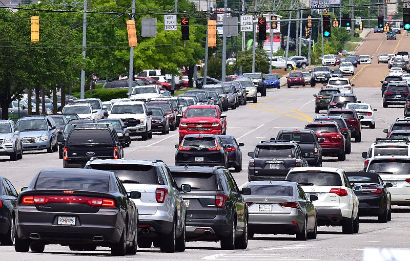 Staff Photo by Robin Rudd /  Traffic on Gunbarrel Road is seen just after 2:00 p.m., in front of the Hamilton Place Mall entrance, on Sunday.  