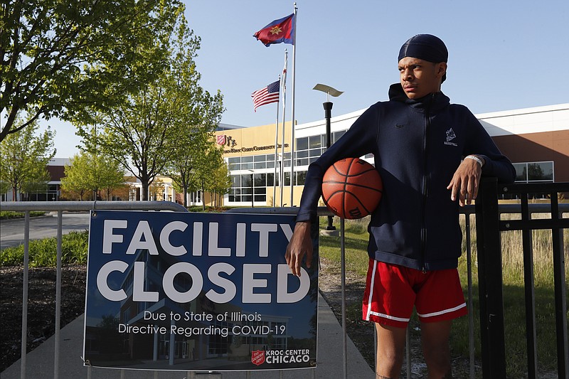 AP photo by Charles Rex Arbogast / Saint Wilkins, 19, poses last Tuesday outside The Salvation Army's Ray and Joan Kroc Corps Community Center in Chicago's South Side. Growing up in a rough part of Chicago's South Side, Wilkins figured he was headed for a life on the streets. "If it wasn't for the Kroc Center, I'd be gang-banging," Wilkins said. "I promise you that."