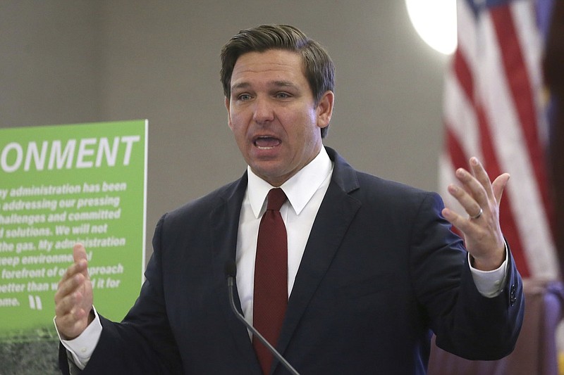 FILE - In this Oct. 29, 2019, file photo, Gov. Ron DeSantis speaks at a news conference on in Tallahassee, Fla. A federal judge has ruled that the Florida law requiring felons to pay legal fees as part of their sentences before regaining the vote is unconstitutional for those unable to pay, or unable to find out how much they owe. U.S. District Court Judge Robert Hinkle has acknowledged he is unlikely to have the last word, expecting the administration of Republican Gov. DeSantis to launch an appeal. (AP Photo/Steve Cannon, File)