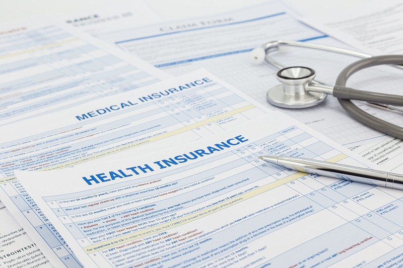 Health insurance tile / photo courtesy of Getty Images