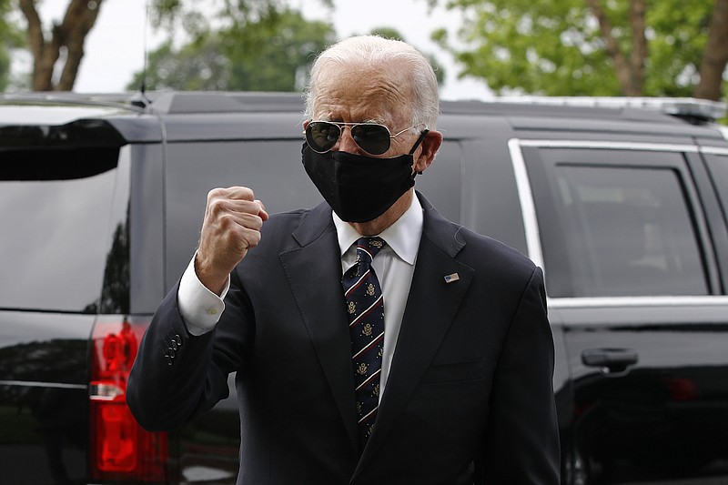 Photo by Patrick Semansky of The Associated Press / Presumed Democratic presidential candidate, former Vice President Joe Biden, speaks with visitors after placing a wreath at the Delaware Memorial Bridge Veterans Memorial Park with Jill Biden on Monday, May 25, 2020, in New Castle, Delaware.