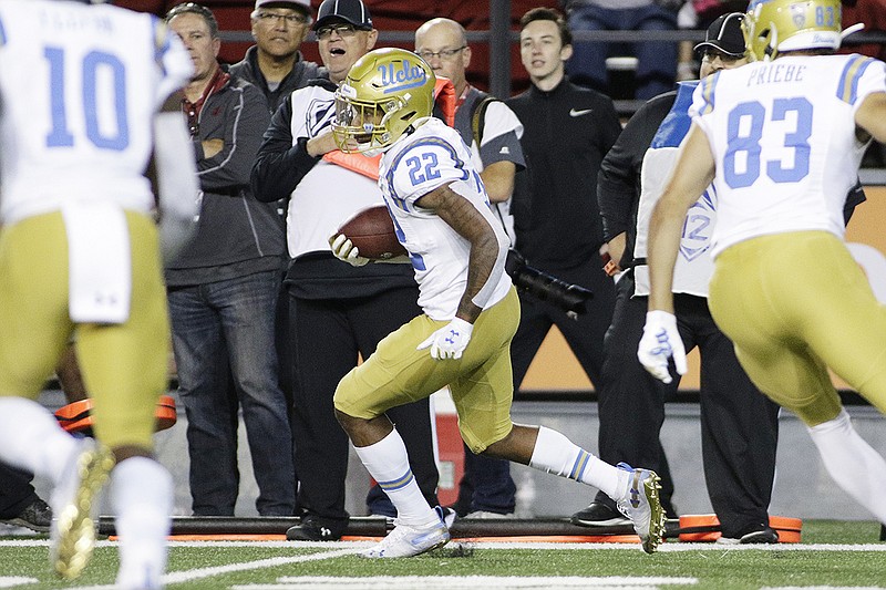 AP file photo by Young Kwak / Former Cleveland High School running back Keegan Jones played on the kickoff return team this past season at UCLA, his first with the Bruins, and despite an interrupted and unsual offseason due to the coronavirus pandemic, he has kept his determination to earn a bigger role as a sophomore.