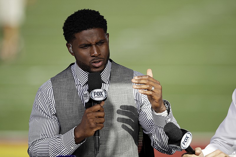 AP photo by Marciso Jose Sanchez / Former University of Southern California and NFL running back Reggie Bush rehearses for a pregame show before USC hosted Utah on Sept. 20, 2019.