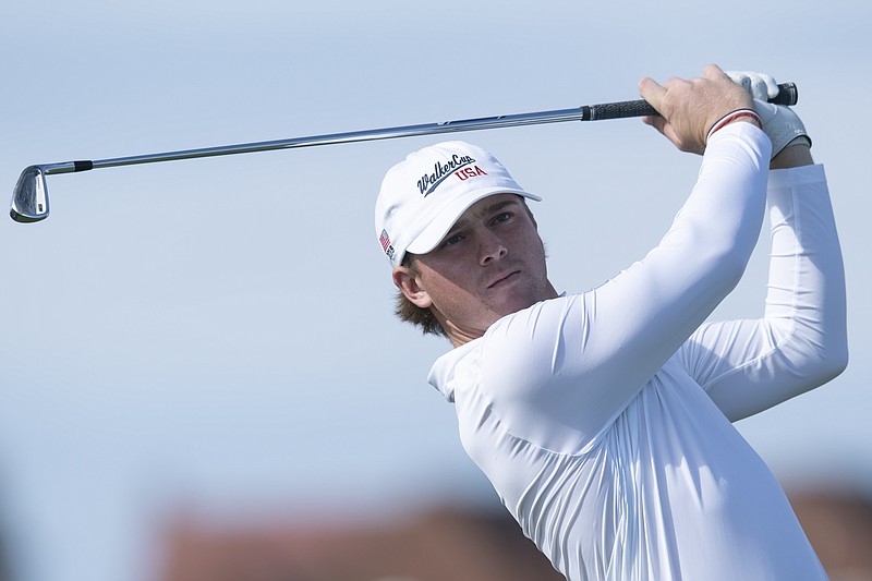 AP photo by Jon Super / John Augenstein of the U.S. team tees off on the second hole during the Walker Cup against Great Britain and Ireland on Sept. 8, 2019, at Royal Liverpool Golf Club in Hoylake, England. Augenstein is returning to Vanderbilt for a fifth season of eligibility because of the COVID-19 pandemic.