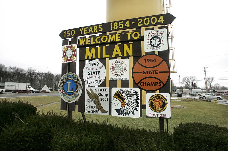 AP photo by Charlie Nye / This welcome sign on State Road 101 greets visitors driving into Milan, Ind., in January 2006. The town is legendary for the Milan Indians boys' basketball team that won the 1954 state championship, when teams of every size still competed in the same tournament. That success inspired the 1986 film "Hoosiers," voted the No. 1 sports movie of all time by AP's sports staff.
