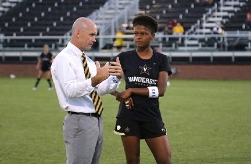 Photo by Abby Carr / Derek Greene talks with former Vanderbilt soccer player Simone Charley. Simone now plays for the Portland Thorns of the NWSL.