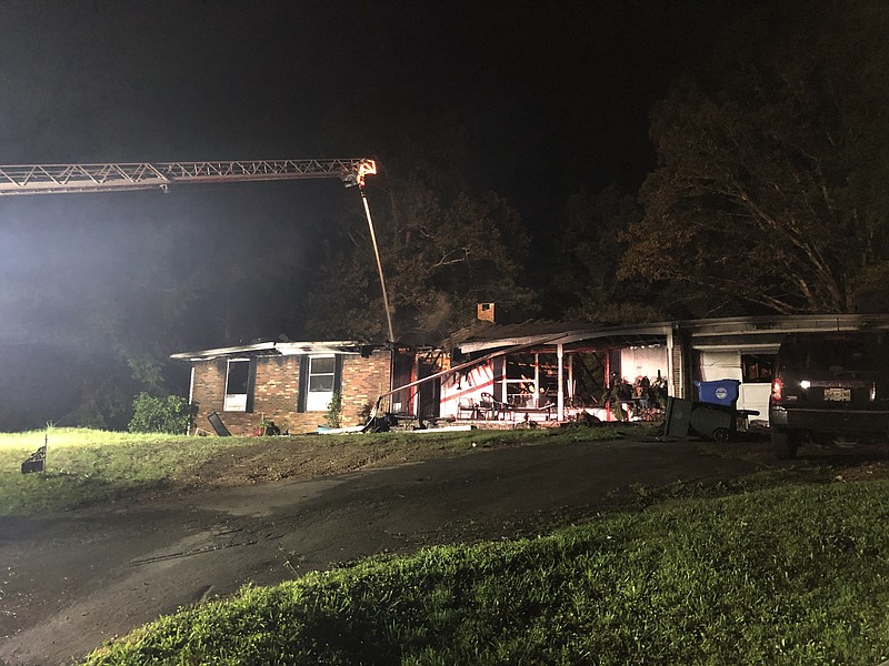 Firefighters battle a fire at a house in the 1300 block of Highland Road on Thursday, May 28, 2020. One person died and three others were injured in the fire. / Photo provided by the Chattanooga Fire Department