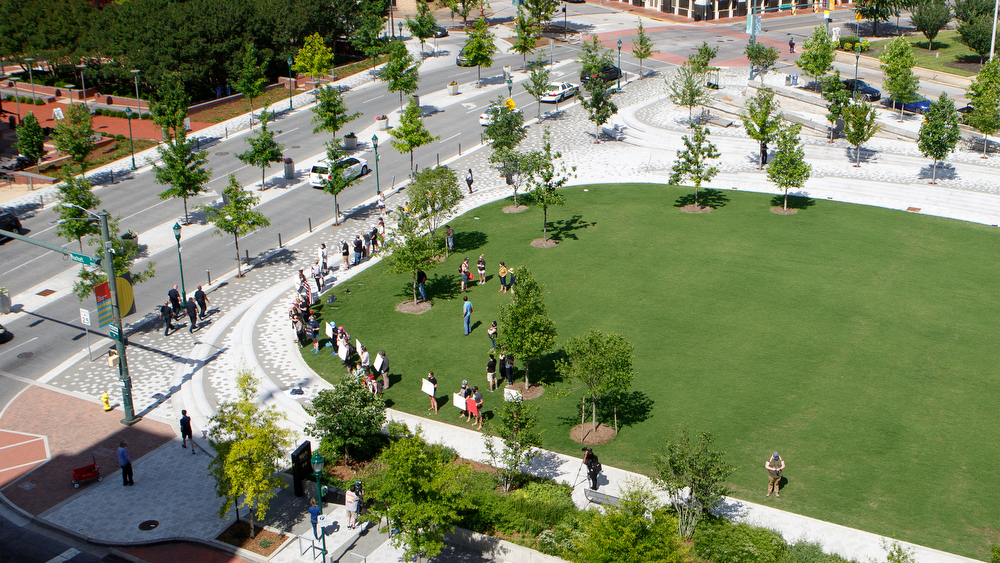 Staff photo by C.B. Schmelter / A crowd gathers to protest the killing of George Floyd at Miller Park on Saturday, May 30, 2020 in Chattanooga, Tenn. Floyd, 46, died after being handcuffed and pinned for several minutes beneath Minneapolis police Officer Derek Chauvin's knee.