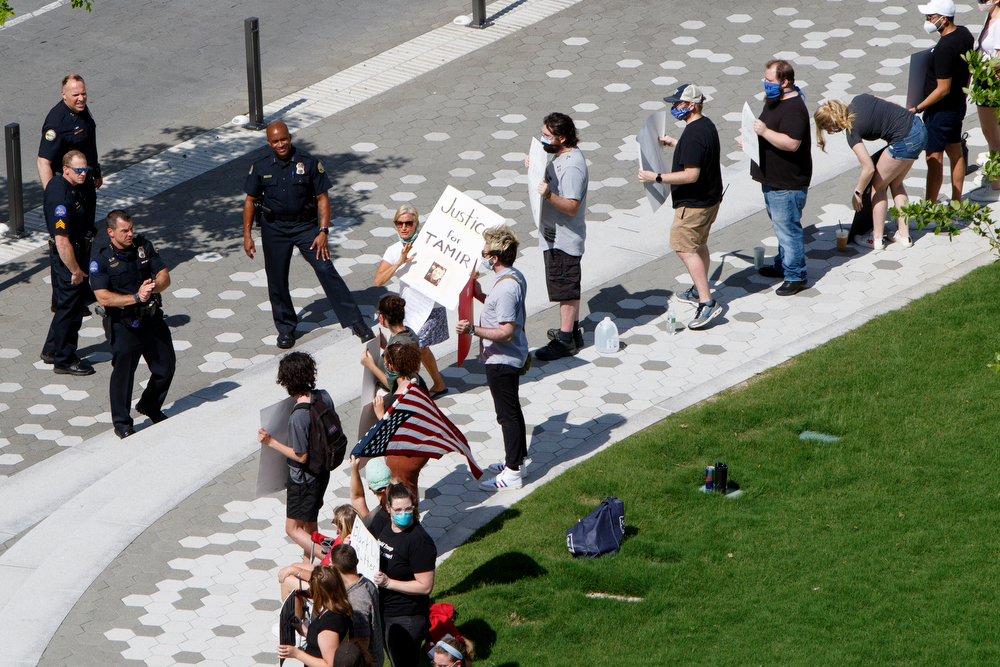 Staff photo by C.B. Schmelter / Chattanooga Police Chief David Roddy, third from left, talks with protestors at Miller Park on Saturday, May 30, 2020 in Chattanooga, Tenn. People gathered to protest the killing of George Floyd. Floyd, 46, died after being handcuffed and pinned for several minutes beneath Minneapolis police Officer Derek Chauvin's knee.