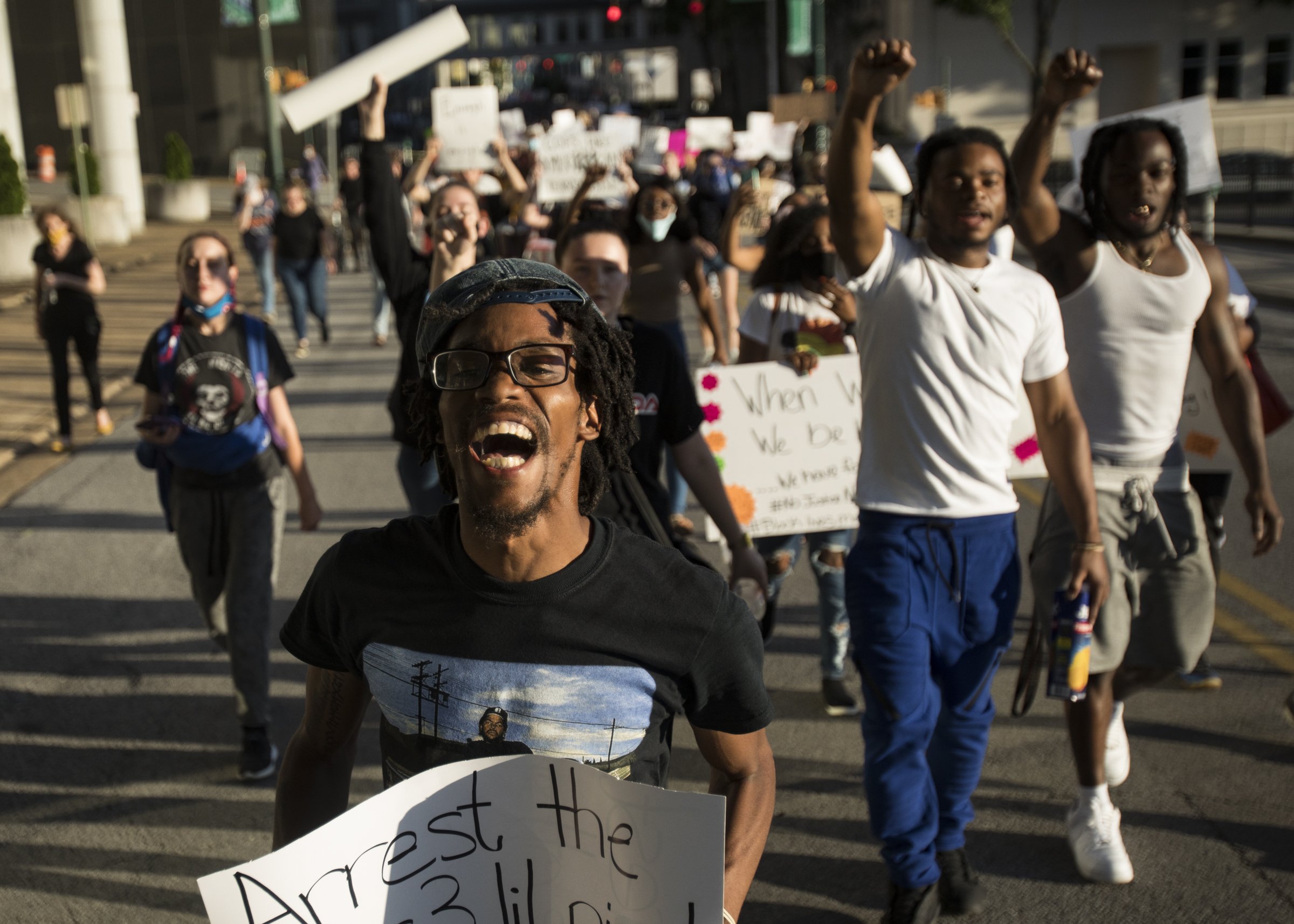 Staff photo by Troy Stolt / Protesters take walk down Cherry Street to protest the Murder or George Floyd on Saturday, May 30, 2020 in Chattanooga, Tenn.