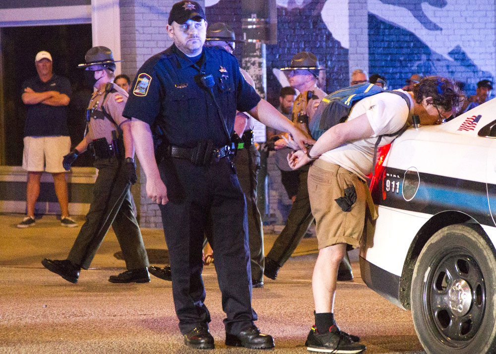 Staff photo by Troy Stolt / Chattanooga Police arrest arrest a man, Saturday night, protesting the murder of George Floyd by Minneapolis police officers.