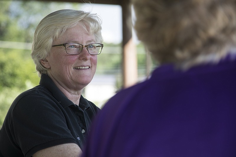 Staff photo by Troy Stolt /  on Friday, May 29, 2020 in Apison, Tenn. Lewis, along with her son Nathan have been making commemorative birds out of downed trees from the series of tornados that hit East Tennessee  late Easter Sunday and Early Monday. 