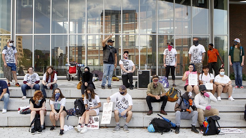 Staff photo by C.B. Schmelter / Protesters gather at Miller Park to protest the killing of George Floyd Monday, June 1, 2020 in Chattanooga, Tenn. Floyd, 46, died after being handcuffed and pinned for several minutes beneath Minneapolis police Officer Derek Chauvin's knee.
