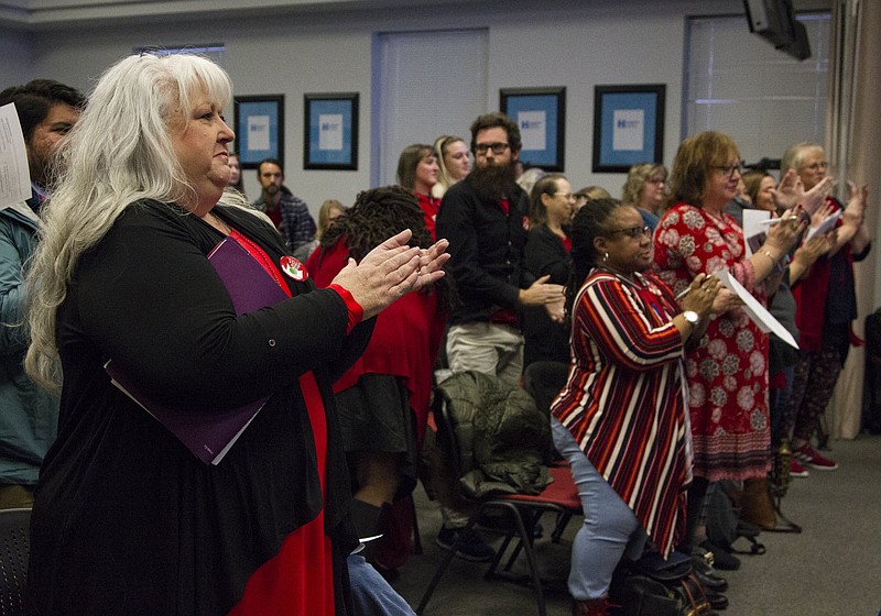 Staff photo by Troy Stolt / Hamilton County school teachers rise for a standing ovation after the Board of Education approves a two-and-a-half percent raise for school teachers  during a meeting of the Hamilton County Board of Education on Thursday, Feb. 20, 2020 in Chattanooga, Tenn.