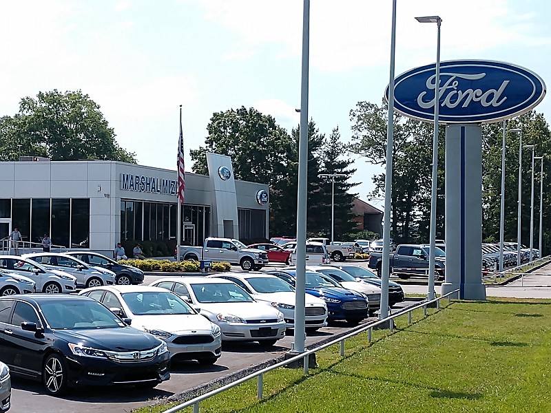 Staff photo by Mike Pare / Vehicles are lined up at Marshal Mize Ford in Chattanooga, which like all auto dealers is grappling with the impact of the coronavirus outbreak.