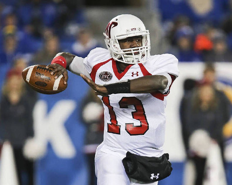 AP photo by David Stephenson / Austin Peay quarterback JaVaughn Craig, a former McCallie standout, passes during the Governors' game against Kentucky on Nov. 19, 2016, in Lexington.