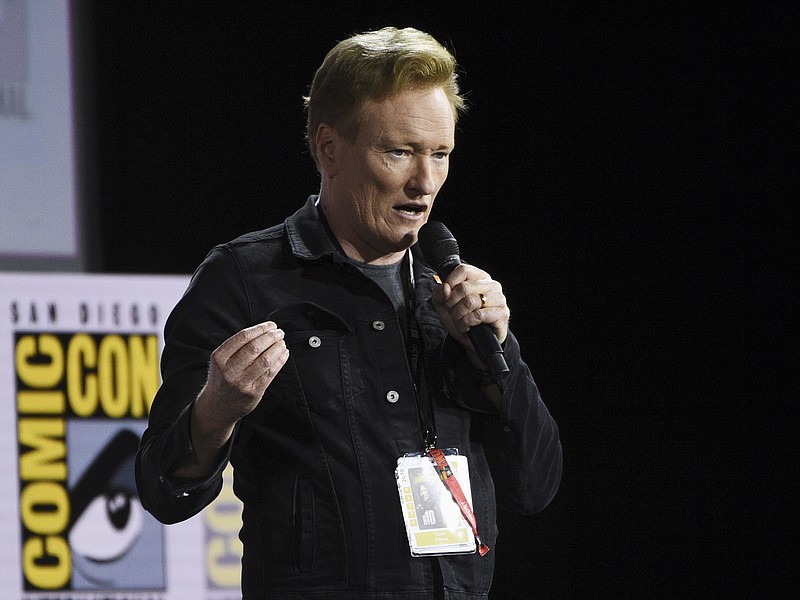 FILE - In this July 18, 2019, file photo, Conan O'Brien introduces Tom Cruise to present a clip from "Top Gun: Maverick" on day one of Comic-Con International in San Diego. Six of America's late-night television comedy hosts - five of them white men - turned serious after the nation's weekend of unrest following the death of George Floyd to suggest they and others need to do more than talk about racism. It has become a ritual - a somewhat inexplicable one, as TBS' O'Brien noted - for these comics to come on the air after acts of terrorism, school shootings or other national traumas to try and make sense of them for their audiences. (Photo by Chris Pizzello/Invision/AP, File)


