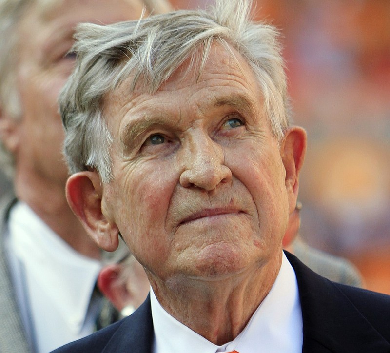Former Tennessee player and head coach Johnny Majors looks up after his No. 45 jersey was retired before an NCAA college football game between Florida and Tennessee, Saturday, Sept. 15, 2012, in Knoxville, Tenn. (AP Photo/Wade Payne)