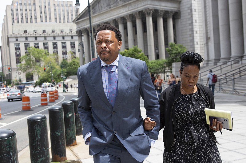 AP photo by Kevin Hagen / Former Oklahoma State assistant basketball coach Lamont Evans leaves a federal court session on June 7, 2019, in New York.