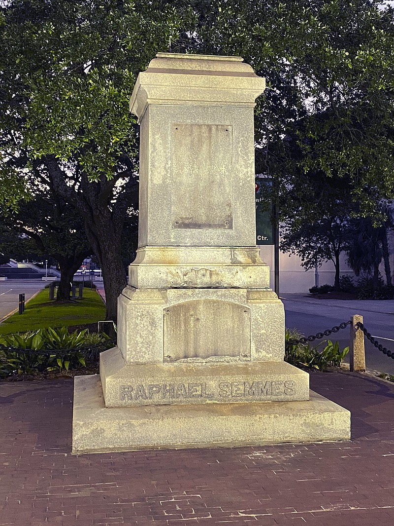 The pedestal where the statue of Admiral Raphael Semmes stands empty, early Friday, June 5, 2020 in Mobile, Ala. The city of Mobile removed the Confederate statue early Friday, without making any public announcements. (WMPI-TV via AP)