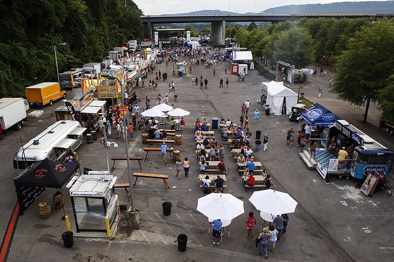 Staff photo by C.B. Schmelter / With Black Stone Cherry performing on the Bud Light Stage, people attend the second night of the Riverbend Festival on Thursday, May 30, 2019 in Chattanooga, Tenn. Lionel Richie headlined the night.