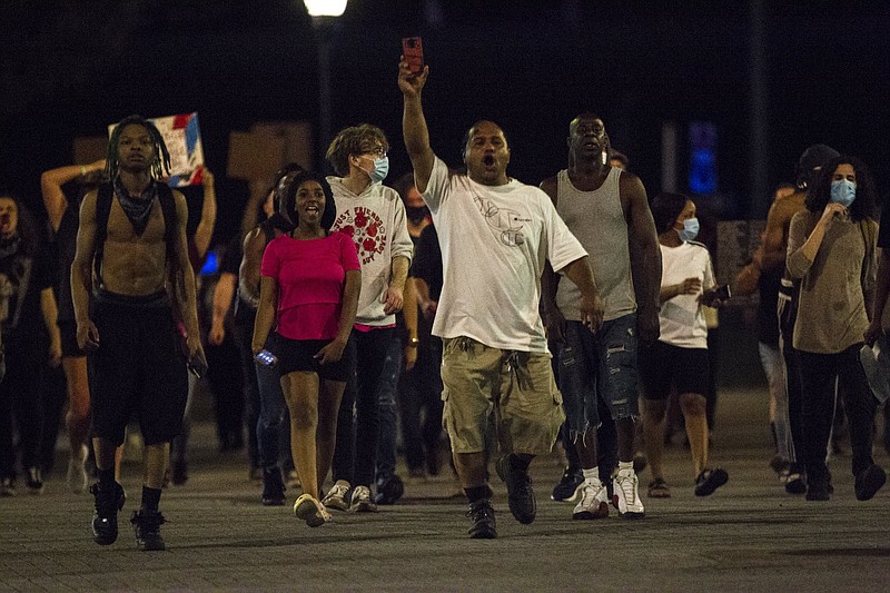 Staff Photo By Troy Stolt / Protesters march down Martin Luther King Jr. Boulevard toward Miller Park during protests in Chattanooga last week due to the death at police hands of George Floyd in Minneapolis on June 1.