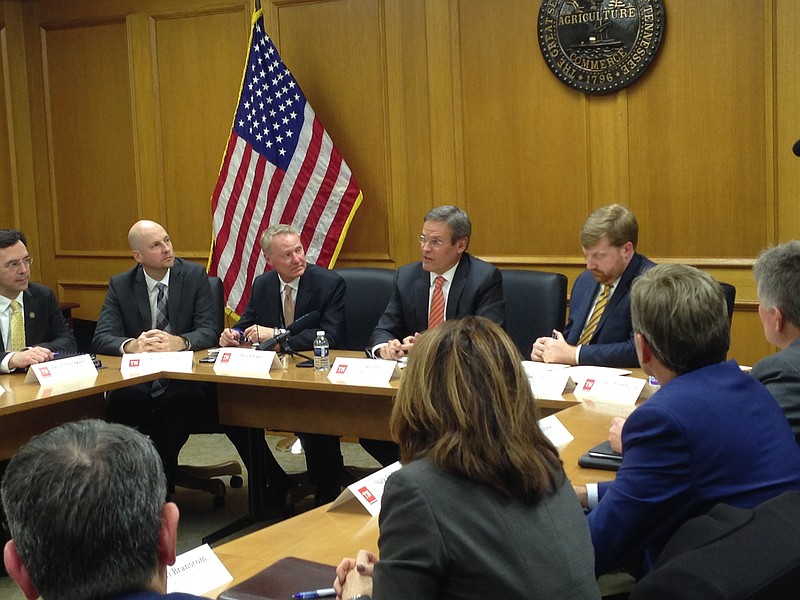 Photo by Andy Sher/Times Free Press / State Finance Commissioner Butch Eley, third from left, sits as Gov. Bill Lee holds forth in this 2019 file photo.