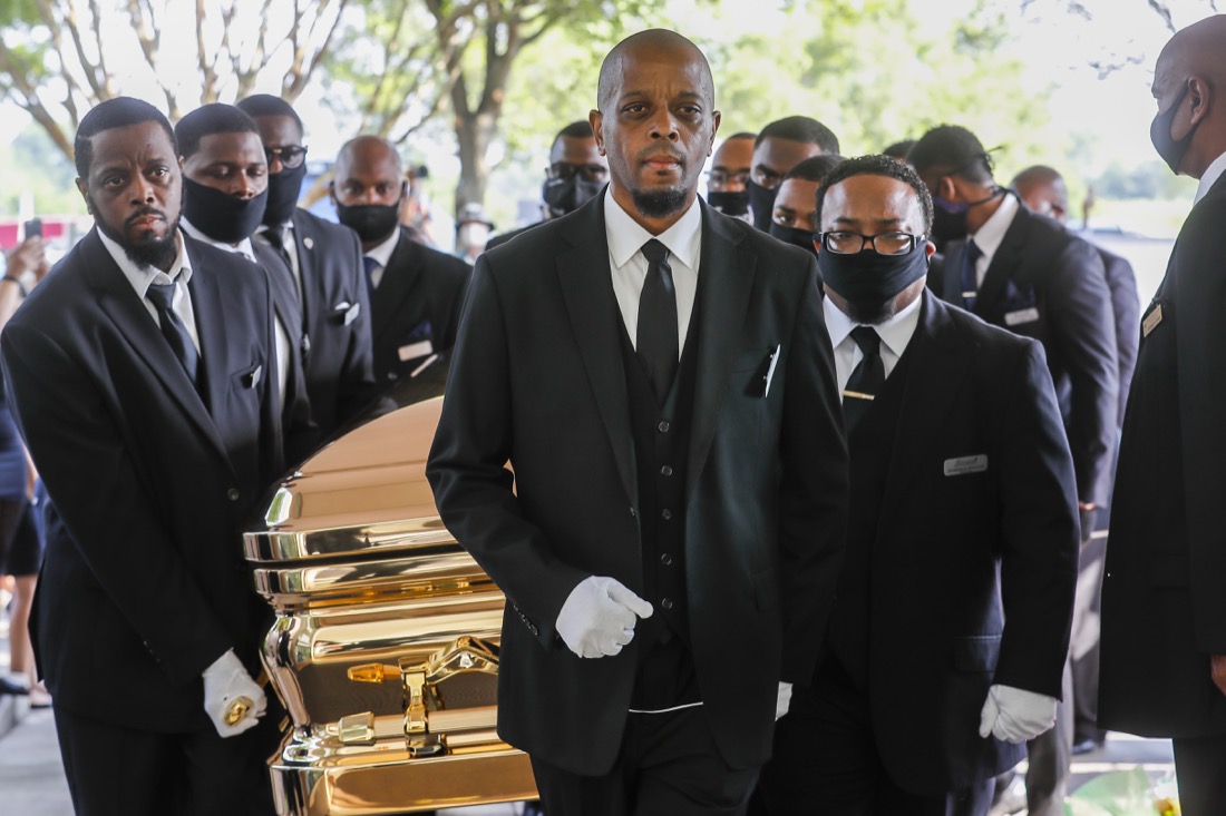 Pallbearers bring the coffin into The Fountain of Praise church in Houston for the funeral for George Floyd on Tuesday, June 9, 2020. Floyd died after being restrained by Minneapolis Police officers on May 25. (Godofredo A. Vásquez/Houston Chronicle via AP, Pool)