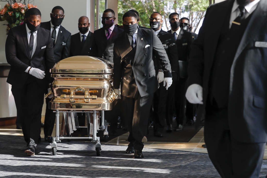 Pallbearers bring the coffin into The Fountain of Praise church in Houston for the funeral for George Floyd on Tuesday, June 9, 2020. Floyd died after being restrained by Minneapolis Police officers on May 25. (Godofredo A. Vásquez/Houston Chronicle via AP, Pool)