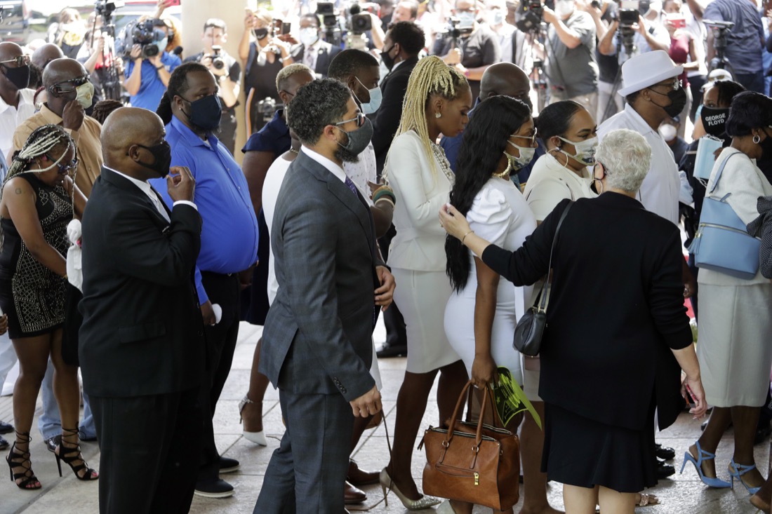 Family and guests arrive for George Floyd's funeral at The Fountain of Praise church in Houston, Tuesday, June 9, 2020, in Houston.(AP Photo/Eric Gay)