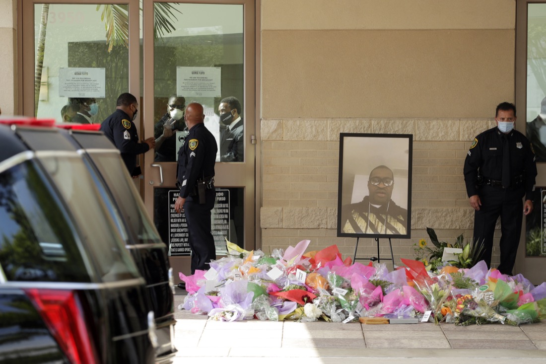 Houston police stand watch at George Floyd's funeral Tuesday, June 9, 2020, in Houston at The Fountain of Praise church.(AP Photo/Eric Gay)