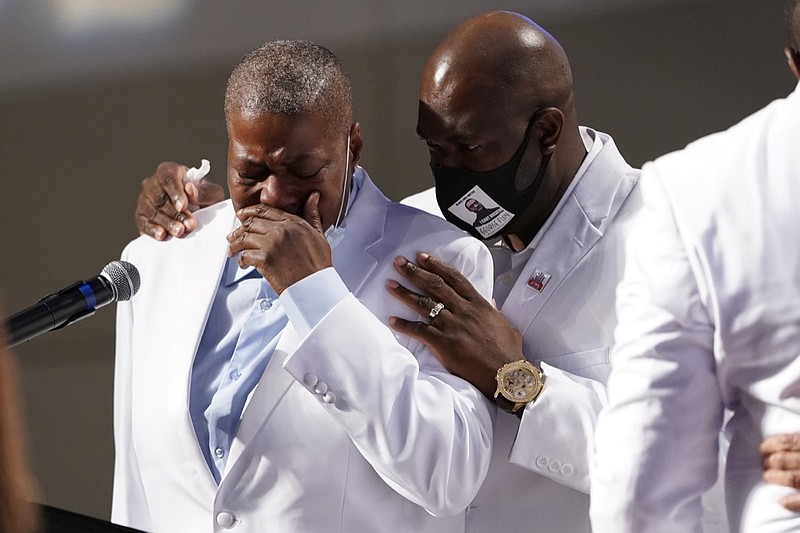 LaTonya Floyd speaks during the funeral service for her brother George Floyd at The Fountain of Praise church Tuesday, June 9, 2020, in Houston. (AP Photo/David J. Phillip, Pool)