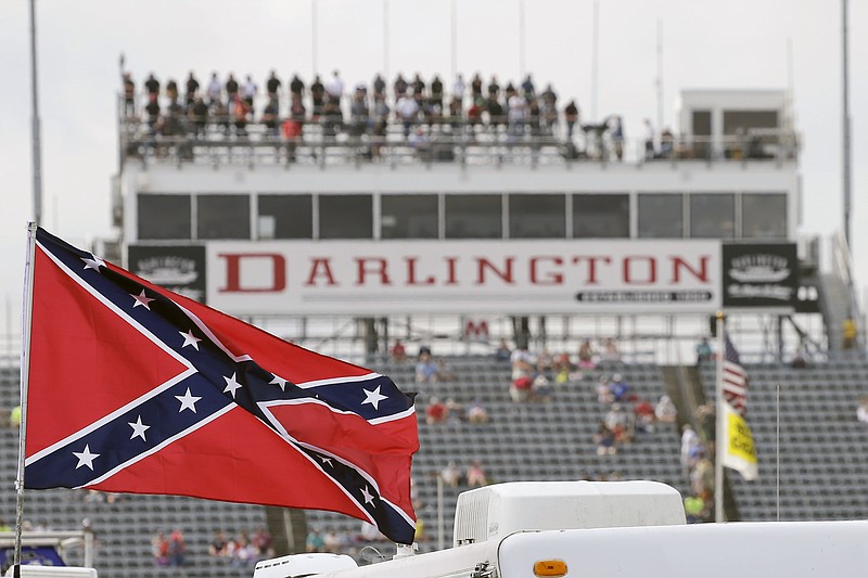 AP photo by Terry Renna / A Confederate flag flies in the infield before a NASCAR Xfinity Series race on Sept. 5, 2015, at South Carolina's Darlington Raceway.