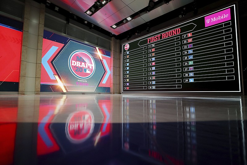 In a photo provided by MLB Photos, the baseball draft board is seen Monday, June 8, 2020 in Secaucus, N.J., for Wednesday's draft. (Alex Trautwig/MLB Photos via AP)