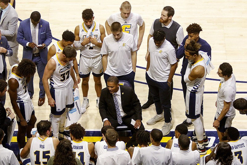 Staff photo by C.B. Schmelter / UTC head coach Lamont Paris talks to his team during their game against Tennessee State at McKenzie Arena on the campus of the University of Tennessee at Chattanooga on Saturday, Nov. 9, 2019 in Chattanooga, Tenn.