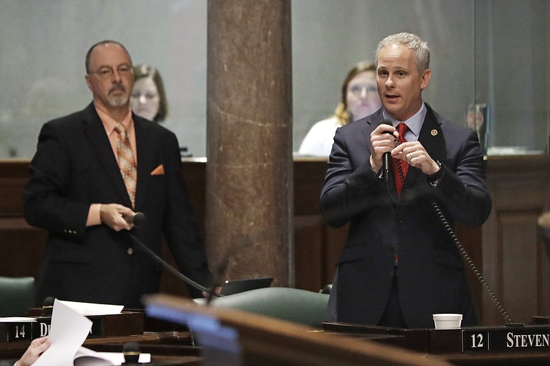 Sen. Mike Bell, R-Riceville, left, during 2019 Senate debate. (AP Photo/Mark Humphrey)