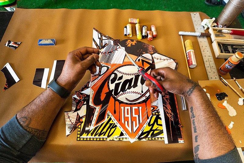 Contributed photo by Alberto Chavez / West Philadelphia artist King Saladeen works in the studio while putting together his Willie Mays card for Topps Project 2020.