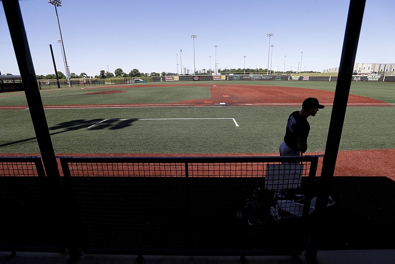 Marshall Rich leaves the field following a workout at Grand Park, Friday, June 12, 2020, in Westfield, Ind. Proceeds from the event will go to Reviving Baseball in the Inner City of Indianapolis. (AP Photo/Darron Cummings)