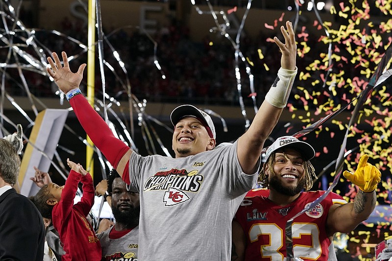 AP photo by David J. Phillip / Kansas City Chiefs quarterback Patrick Mahomes, left, and safety Tyrann Mathieu celebrate after rallying to beat the San Francisco 49ers at Super Bowl LIV on Feb. 2 in Miami Gardens, Fla.