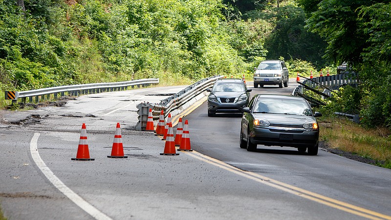 Staff photo by C.B. Schmelter / Traffic moves along one lane on State Route 27 on Wednesday, June 10, 2020 in Marion County, Tenn. The road, just over the county line, is down to one lane in some locations because of deterioration.