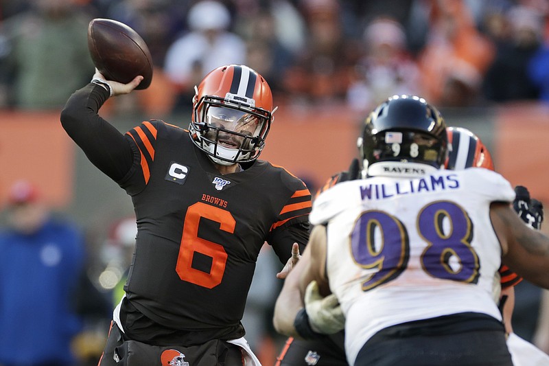 AP photo by Ron Schwane / Cleveland Browns quarterback Baker Mayfield passes during a home game against the Baltimore Ravens on Dec. 22, 2019.