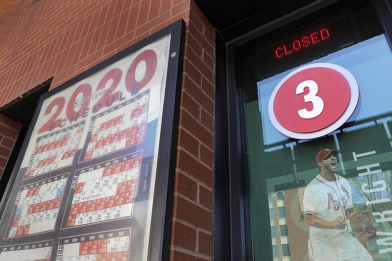 AP photo by Jeff Roberson / A ticket window outside Busch Stadium, home of the St. Louis Cardinals, is closed on March 25, 2020. The start of the regular season is on hold indefinitely because of the coronavirus pandemic and the inability of MLB teams and players to reach an agreement on how to proceed where the schedule and salaries are concerned.