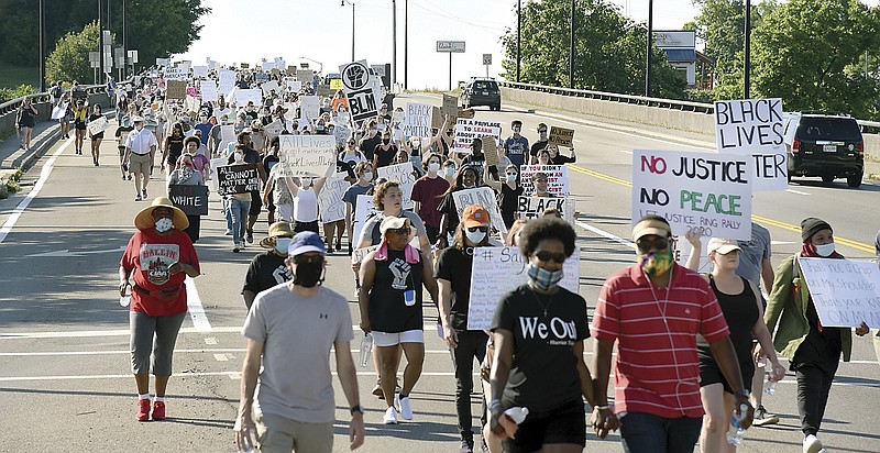 Thousands participated in a Black Lives Matter march through Alcoa and Maryville, Tenn., Sunday June 7, 2020. The course of the march led attendees from the Martin Luther King Jr. Community Center to the Blount County Courthouse inn Blount County . (Scott Keller/The Daily Times via AP)


