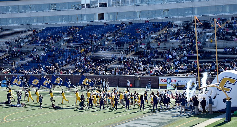 Staff Photo by Robin Rudd/  The Mocs take the field.  The University of Tennessee at Chattanooga Mocs hosted The Citadel Bulldogs in Southern Conference football at Finley Stadium on November 16, 2019.