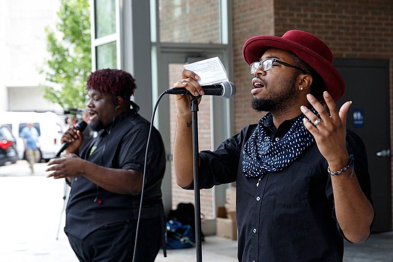 Ahmir Montez, right, and Garrell Woods perform with the group Young Gifted & Black Chattanooga during a Juneteenth Celebration in Miller Park on Wednesday, June 19, 2019, in Chattanooga, Tenn. Juneteenth commemorates the abolition of slavery in the United States on June 19, 1865.