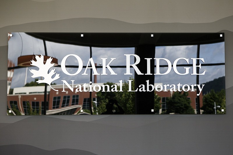 Staff photo by C.B. Schmelter / A sign for Oak Ridge National Laboratory is seen inside the conference center/visitor center/cafeteria building on Monday, June 10, 2019 in Oak Ridge, Tenn.