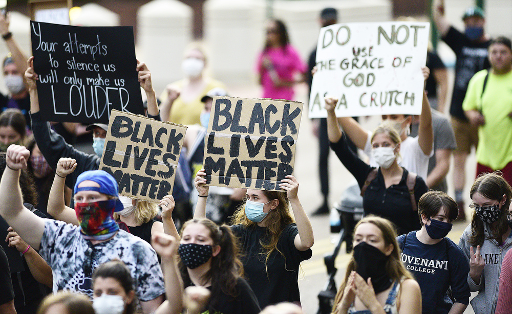 Staff Photo by Robin Rudd / The march heads south on Market Street. Protesters gathered at Miller Park and marched south past some of Chattanooga's tourism icons in reaction to the killing of George Floyd and other police brutalities on June 17, 2020.